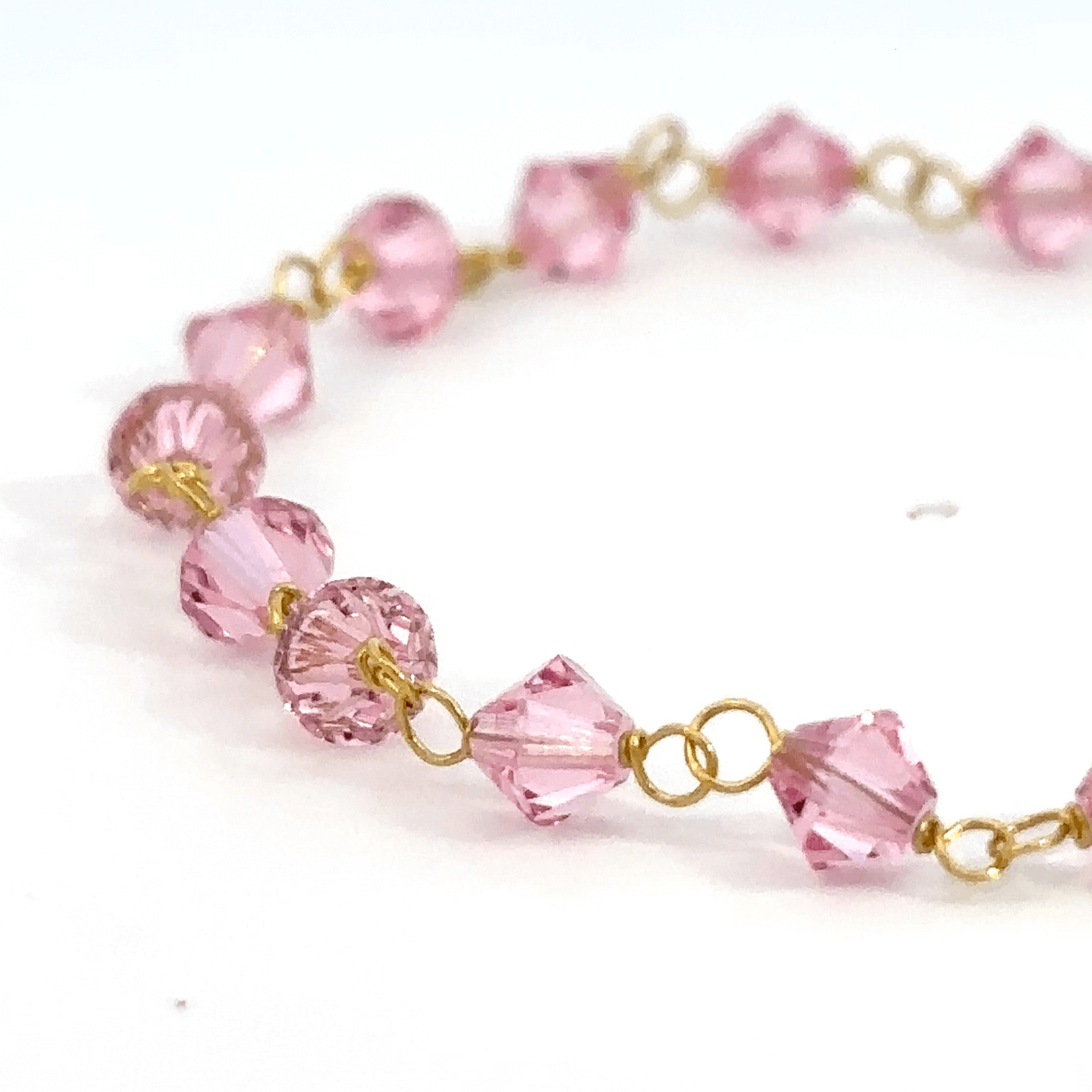 ''Indigo'' Gouden 14k babybracelet met ogri-ai kralen en naamplaat